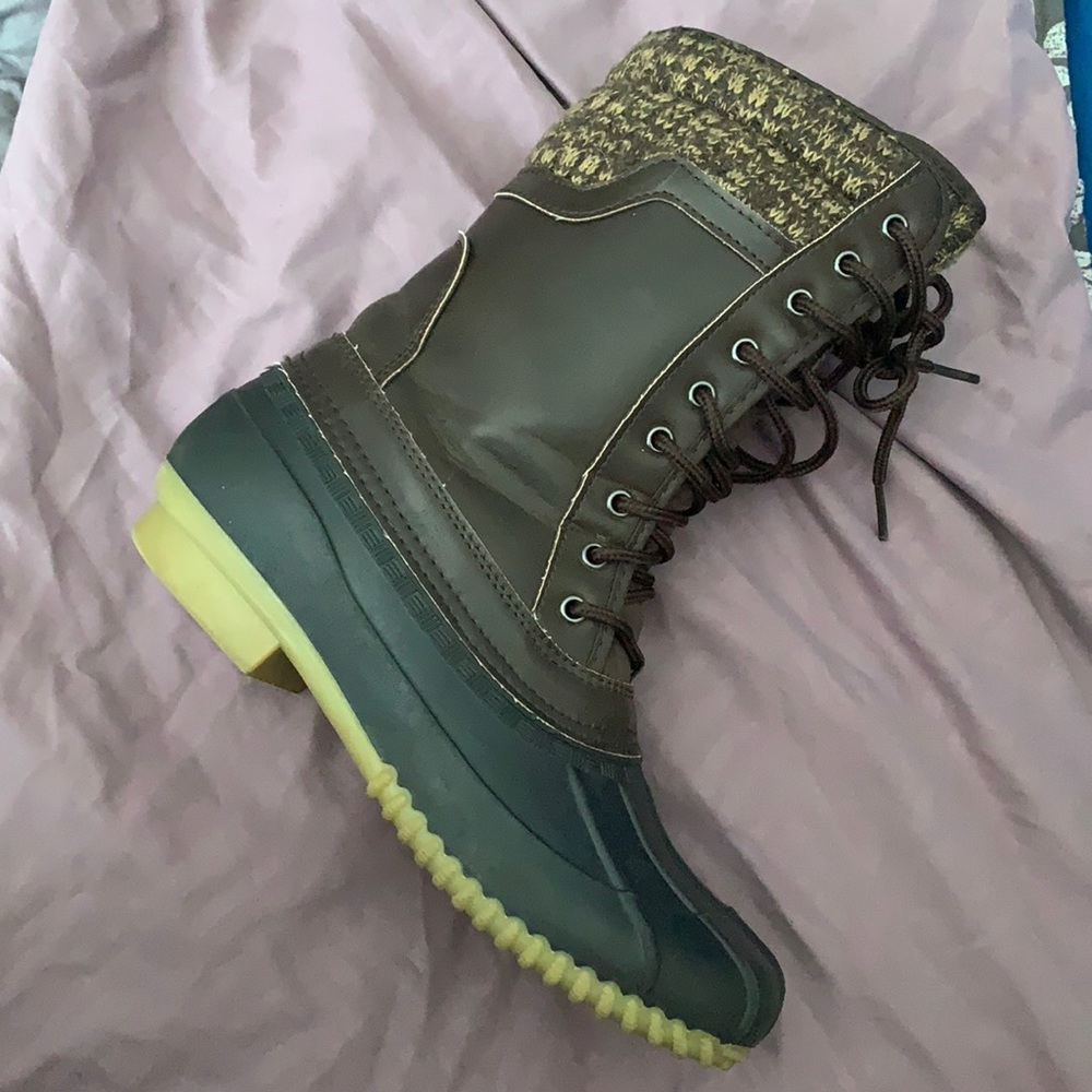 Browns and black Duck boots